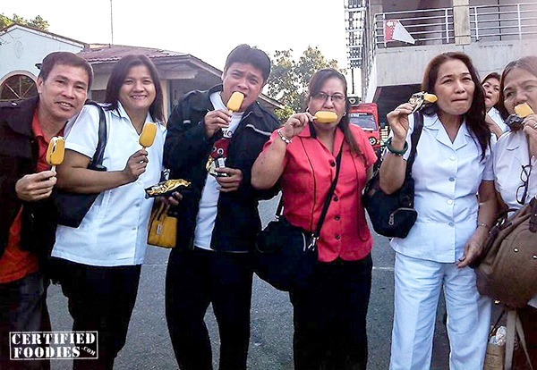 Our nanay's colleagues enjoying their Magnum Gold ice cream bars