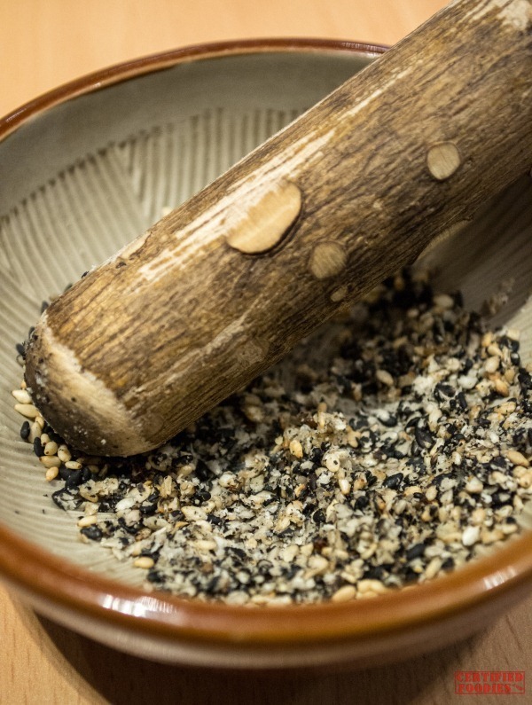 The Yabu ritual includes grinding these roasted sesame seeds