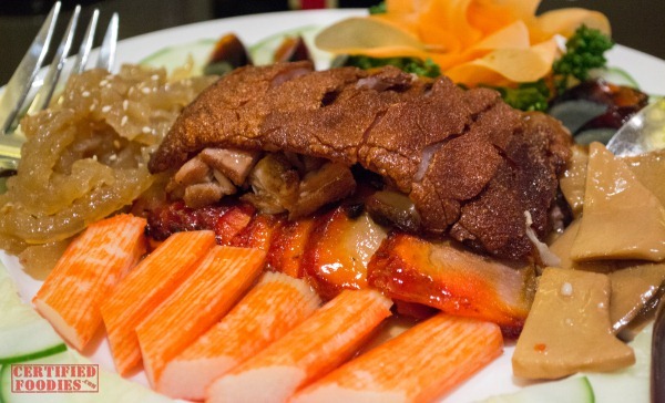 Xin Tian Di - Suckling Pig combination with seaweed, crabsticks and pork asado