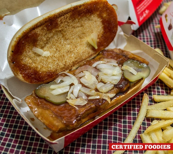 McRib sandiwch with pickles and onions