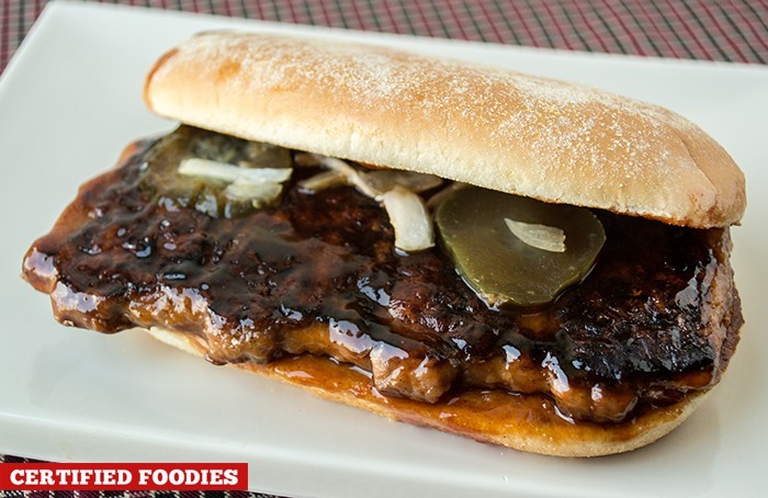 McRib sandwich - juicy barbecue pork patty, with pickles and onions